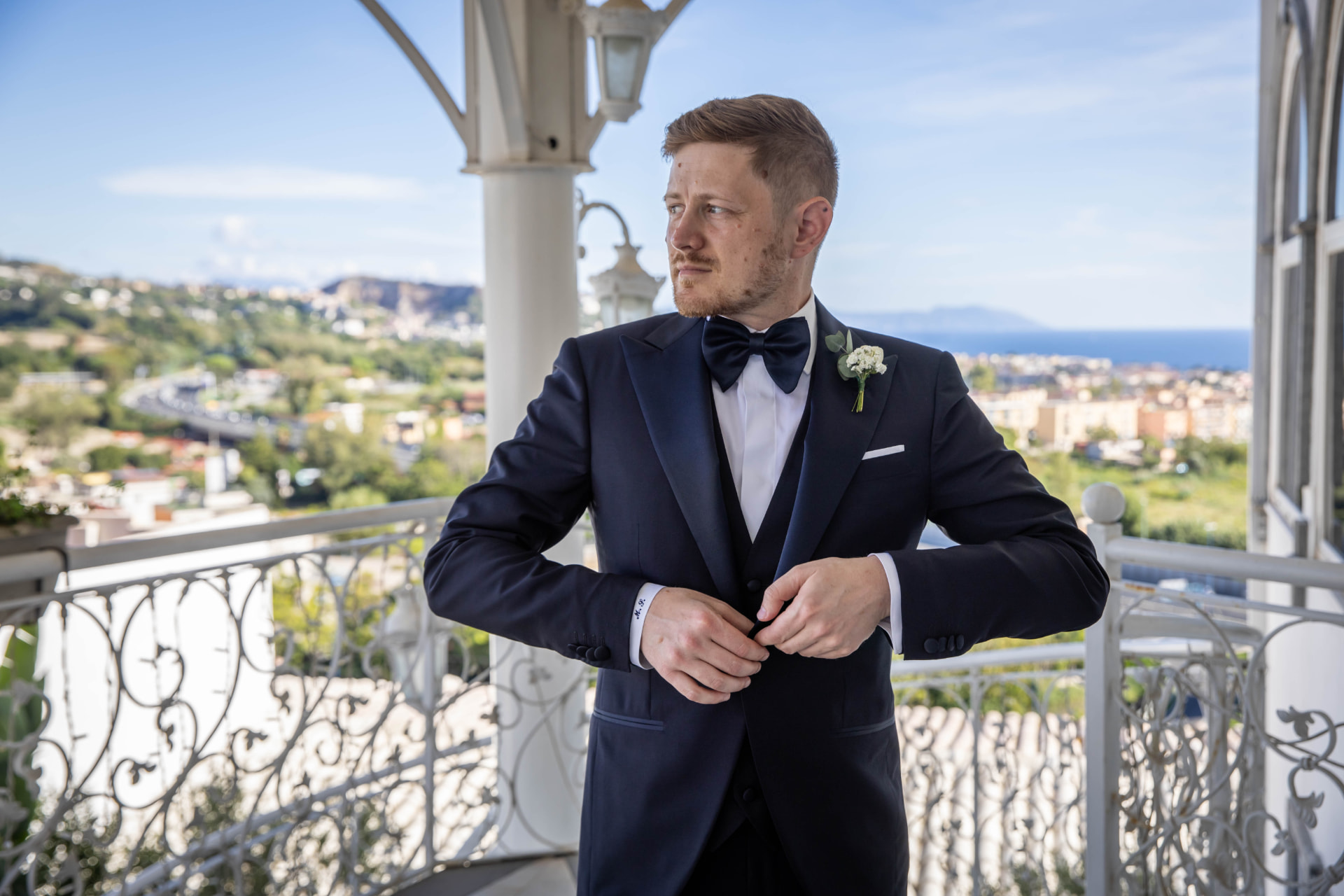 Cliffside wedding portrait above the sea