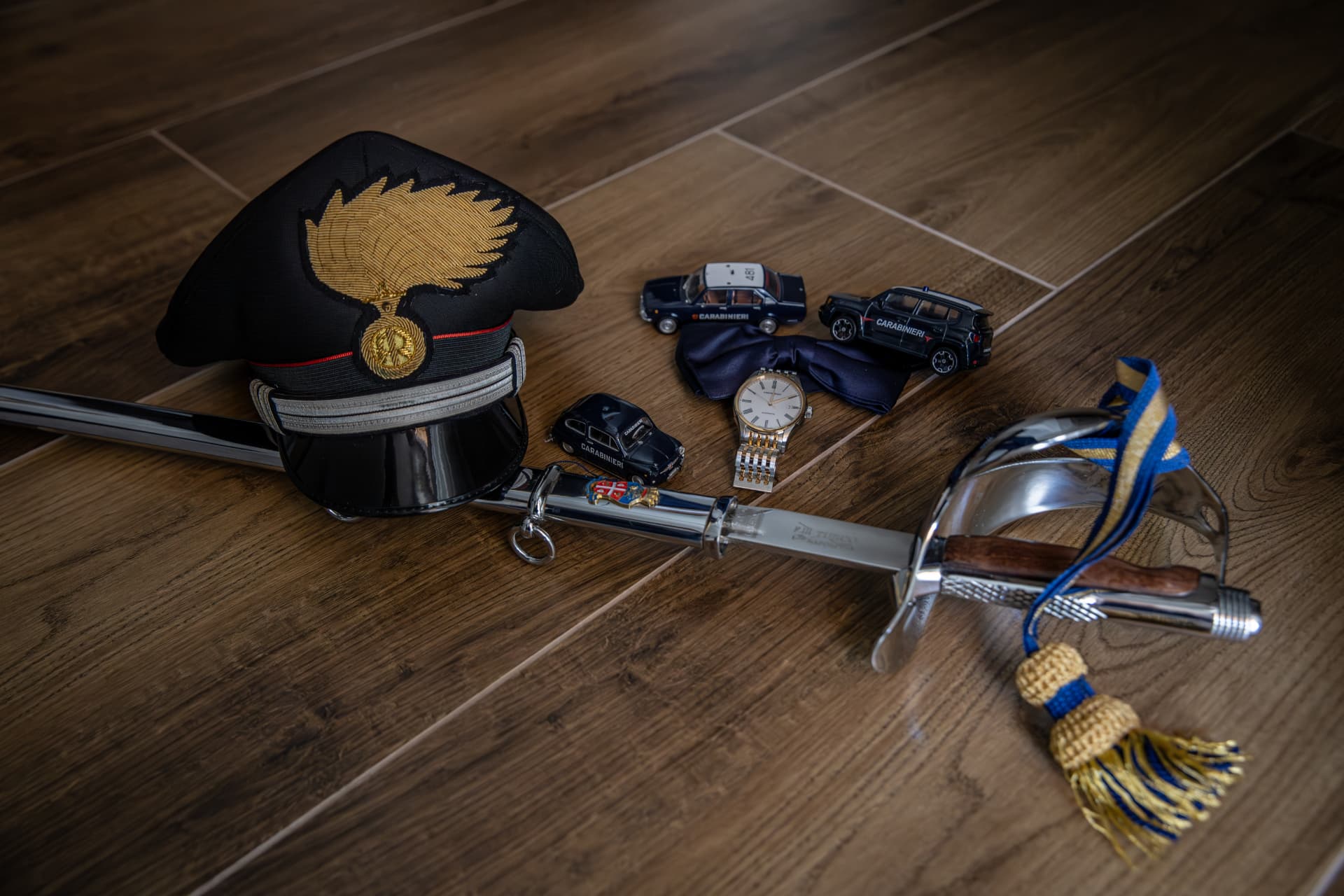 Ceremonial uniform and wedding details arranged together